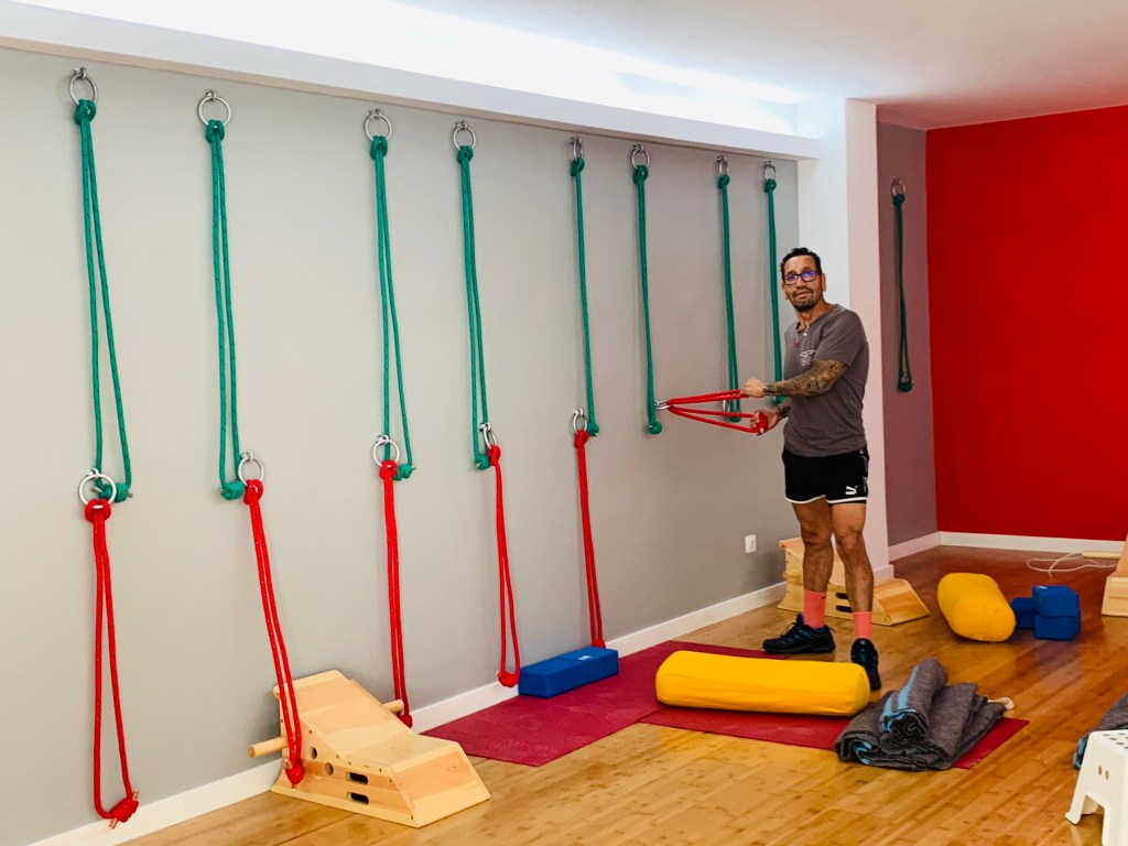 Alfonso Castano setting up the ropes in the new Iyengar Yoga Studio
